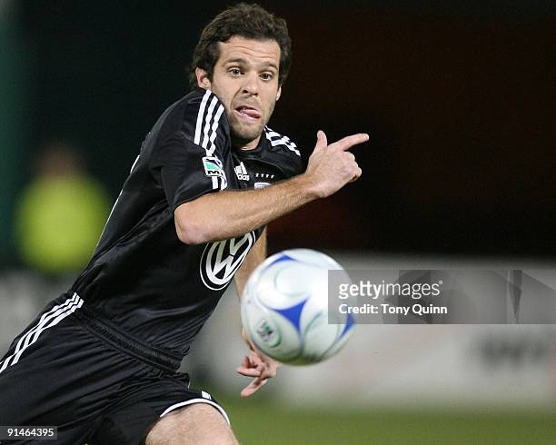 Ben Olsen of D.C. United races to catch up to the ball during an MLS match against Chivas USA at RFK Stadium on October 3, 2009 in Washington,...