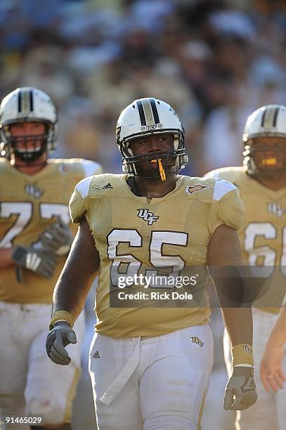 Right guard Cliff McCray of the Central Florida Knights looks on during the game against the Memphis Tigers at Bright House Networks Stadium on...