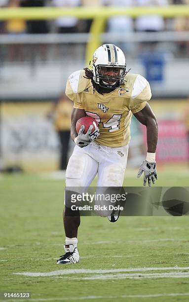 Tailback Brynn Harvey of the Central Florida Knights rushes against the Memphis Tigers at Bright House Networks Stadium on October 3, 2009 in...