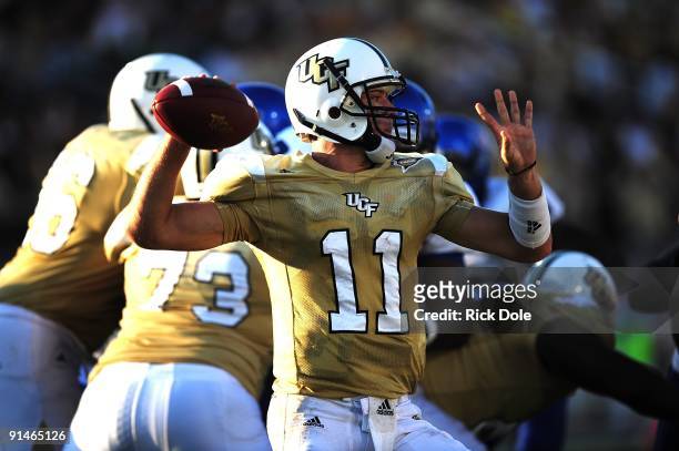 Quarterback Brett Hodges of Central Florida Knights drops back to pass against the Memphis Tigers at Bright House Networks Stadium on October 3, 2009...