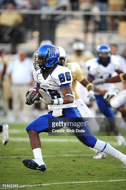 Wide receiver Curtis Johnson of the Memphis Tigers runs against the Central Florida Knights at Bright House Networks Stadium on October 3, 2009 in...