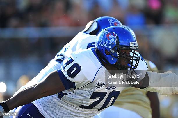 Right tackle Tommy Walker of the Memphis Tigers blocks against the Central Florida Knights at Bright House Networks Stadium on October 3, 2009 in...