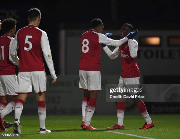 Eddie Nketiah celebrates scoring Arsenal's 1rd goal with Joe Willock and Emile Smith Rowe during the Premier League 2 match between Arsenal and...