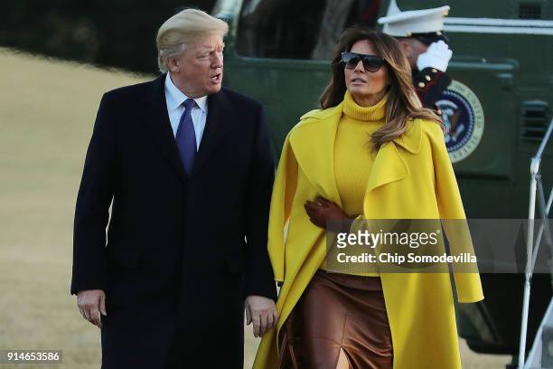 President Donald Trump and first lady Melania Trump return to the White House after a day trip to Cincinnati, Ohio, February 5, 2018 in Washington,...