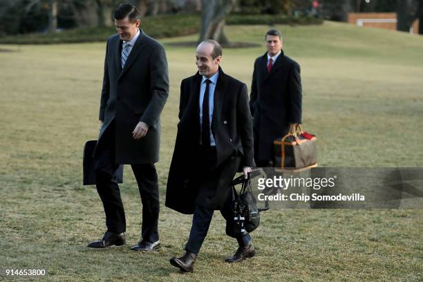 White House Staff Secretary Rob Porter and Senior Advisor to the President Stephen Miller return to the White House after a day trip with President...