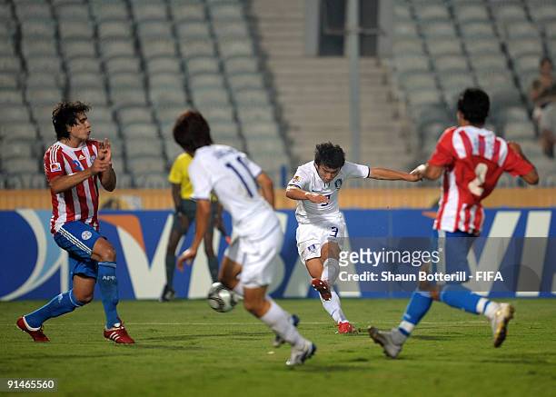 Min Woo Kim of Korea Republic scores his first goal during the FIFA U20 World Cup Round of 16 match between Paraguay and Korea Republic at the Cairo...