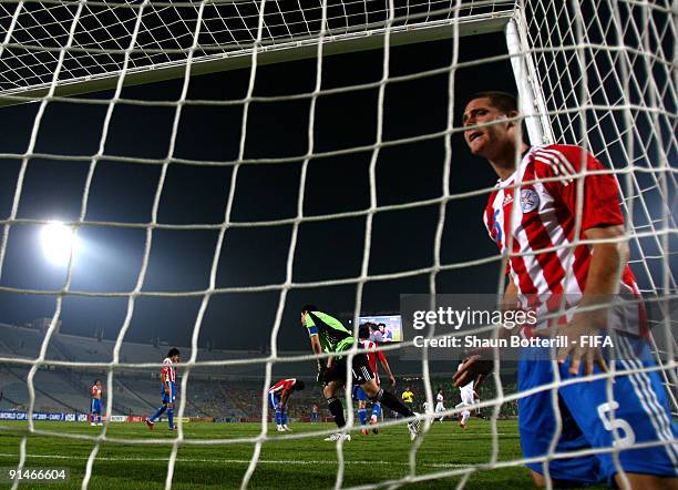 Francisco Silva of Paraguay and team-mates are dejected after conceding a goal during the FIFA U20 World Cup Round of 16 match between Paraguay and...