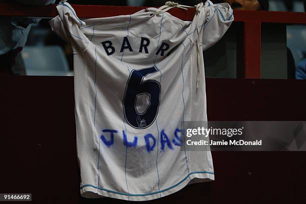 Gareth Barry of Manchester City is welcomed back to Villa Park with a message on a replica shirt during the Barclays Premier League match between...