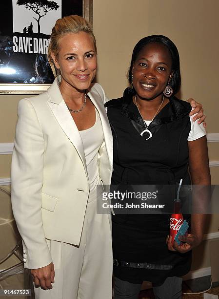 Honoree actress Maria Bello and presenter Darfurian Niemat Ahmadi attend Variety's 1st Annual Power of Women Luncheon at the Beverly Wilshire Hotel...