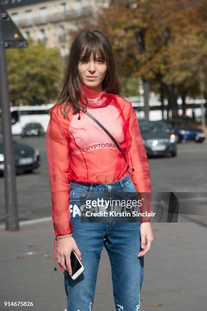 Fashion designer and founder of fashion label Anna K, Anna Karenina wears an Anna K blouse and jeans day 5 of Paris Womens Fashion Week Spring/Summer...