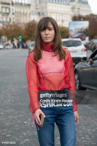 Fashion designer and founder of fashion label Anna K, Anna Karenina wears an Anna K blouse and jeans day 5 of Paris Womens Fashion Week Spring/Summer...