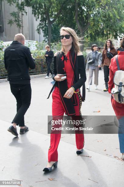 Editorial Director for Kirna Zabete, Jessica Minkoff for wears Ray Ban sunglasses, Faith Connexion trousers, Chanel shoes, Givenchy scarf and a...