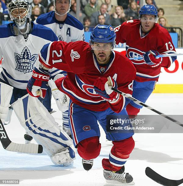 Brian Gionta of the Montreal Canadiens charges after the puck in a game against the Toronto Maple Leafs on October 1, 2009 at the Air Canada Centre...