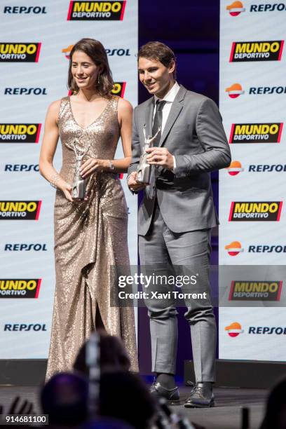 Garbiñe Muguruza and Rafael Nadal receive the best sportwoman and sportman of the year award during the 70th Mundo Deportivo Gala on February 5, 2018...