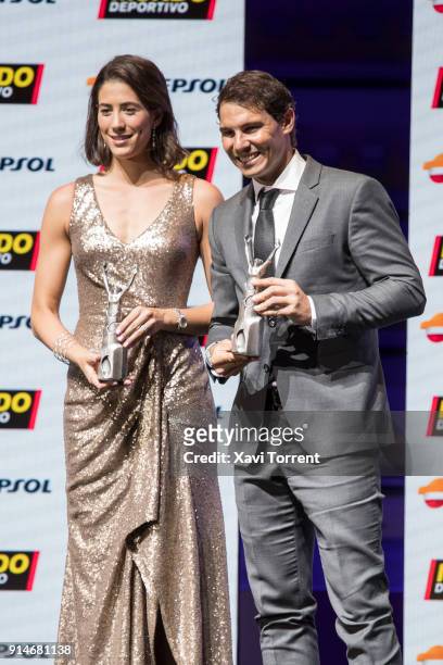 Garbiñe Muguruza and Rafael Nadal receive the best sportwoman and sportman of the year award during the 70th Mundo Deportivo Gala on February 5, 2018...