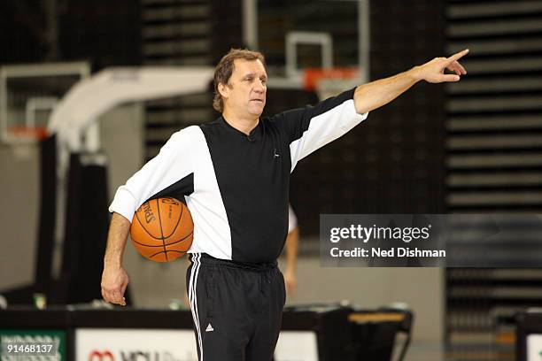 Head Coach Flip Saunders of the Washington Wizards speaks to the team during the 2009 NBA Training Camp at the Siegel Center on the campus of...