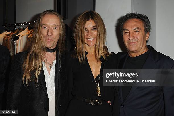 John Richmond and Carine Roitfeld, Saverio Moschillo attend the John Richmond Cocktail party as part of the Paris Womenswear Fashion Week at the John...