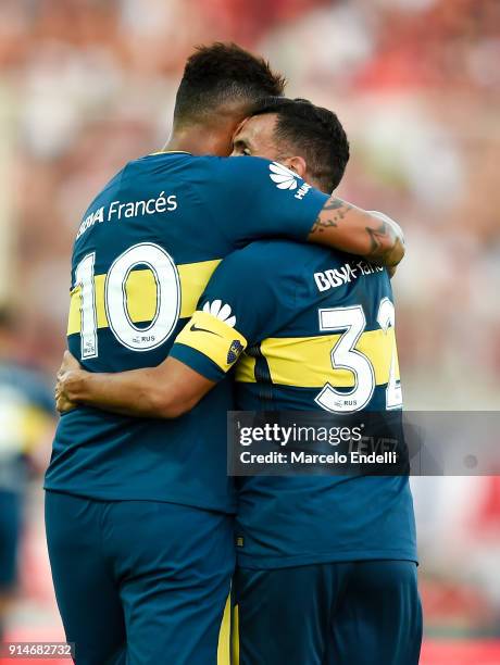 Carlos Tevez of Boca Juniors celebrates with Edwin Cardona of Boca Juniors after scoring the first goal of his team during a match between San...