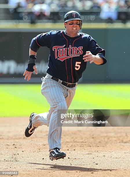 Michael Cuddyer of the Minnesota Twins runs the bases against the Detroit Tigers during the game at Comerica Park on October 1, 2009 in Detroit,...