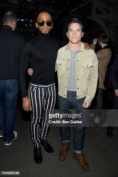 Actors Eric West and Mike Doyle attend the Todd Snyder fashion show during New York Fashion Week at Pier 59 on February 5, 2018 in New York City.