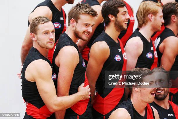 Debutant Devon Smith hugs Martin Gleeson during an Essendon Bombers media session at The Hangar on February 6, 2018 in Melbourne, Australia.