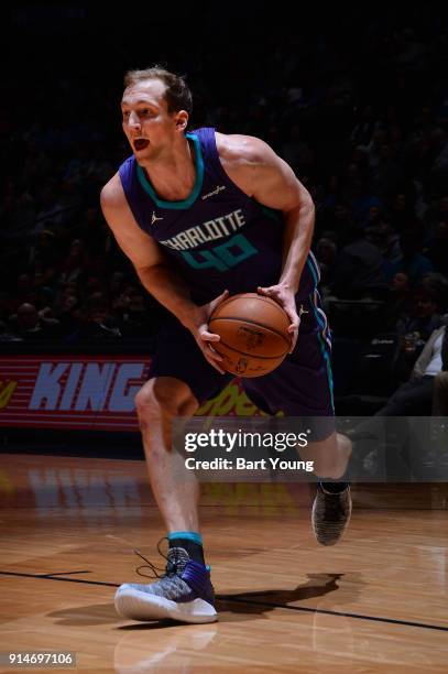 Cody Zeller of the Charlotte Hornets handles the ball during the game against the Denver Nuggets on February 5, 2018 at the Pepsi Center in Denver,...