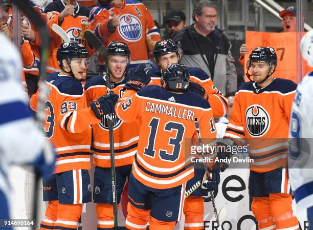 Matthew Benning, Connor McDavid, Leon Draisaitl, Andrej Sekera and Michael Cammalleri of the Edmonton Oilers celebrate after a goal during the game...