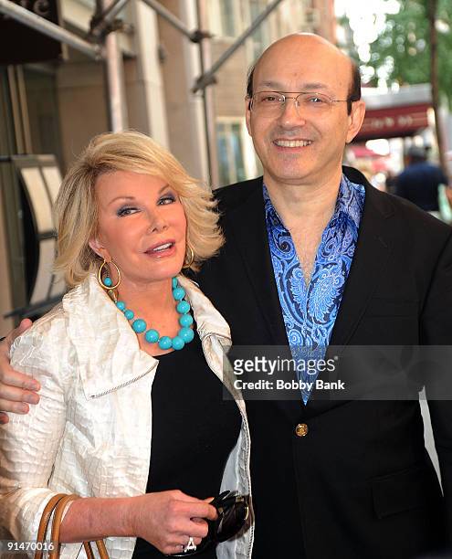 Television personality Joan Rivers with her new boyfriend Norm Zada of Perfect 10 Magazine pose with Joan's "Friendship" ring after having lunch on...
