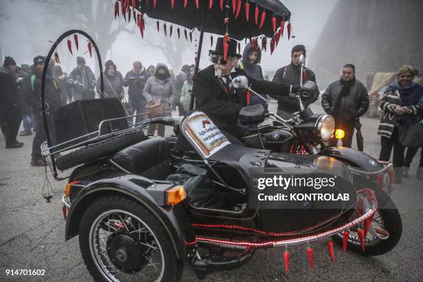 Man in black with a sidecar during the Candelora festival at Montevergine Sanctuary in Ospidaletto d'Alpinolo a little village in the south of Italy....