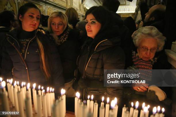 People pray during the Candelora festival at Montevergine Sanctuary in Ospidaletto d'Alpinolo a little village in the south of Italy. The Sanctuary...