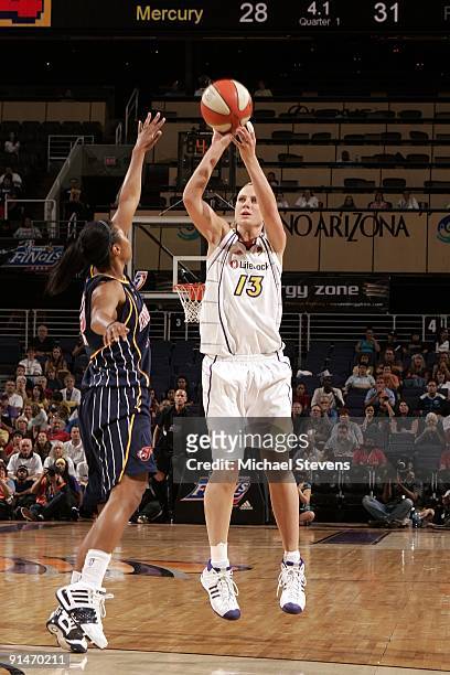 Penny Taylor of the Phoenix Mercury shoots a jump shot over Briann January of the Indiana Fever in Game one of the WNBA Finals during the 2009 WNBA...