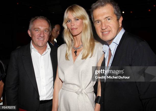 François-Henri Pinault, Claudia Schiffer and Mario Testino attend Yves Saint Laurent Pret a Porter show as part of the Paris Womenswear Fashion Week...