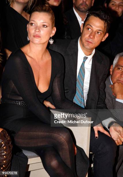 Kate Moss and Jamie Hince attend Yves Saint Laurent Pret a Porter show as part of the Paris Womenswear Fashion Week Spring/Summer 2010 on October 5,...