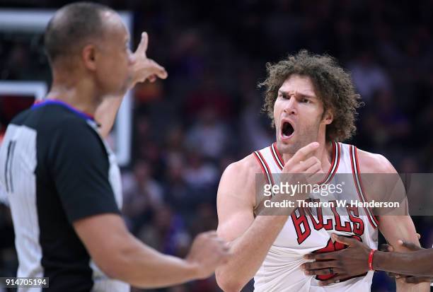 Robin Lopez of the Chicago Bulls argues over a foul called by referee Rodney Mott during an NBA basketball game against the Sacramento Kings at...