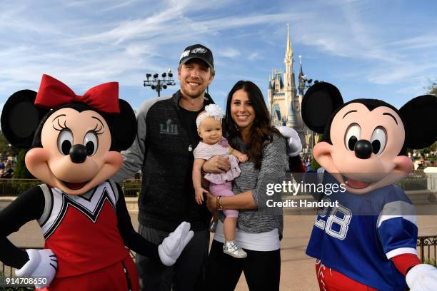 In this handout photo provided by Disney Resorts, Nick Foles of the Super Bowl LII winning team, the Philadelphia Eagles with his wife Tori Foles and...