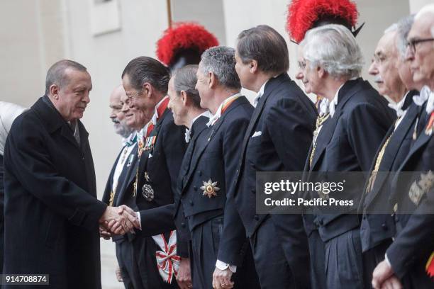 Turkey's President Recep Tayyip Erdogan is welcomed by Pope's Gentiluomini upon his arrival at the Apostolic Palace to attend a private audience with...