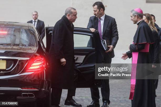 Turkey's President Recep Tayyip Erdogan is welcomed by Archbishop Georg Gaenswein, prefect of the Papal Household, upon his arrival at the Apostolic...