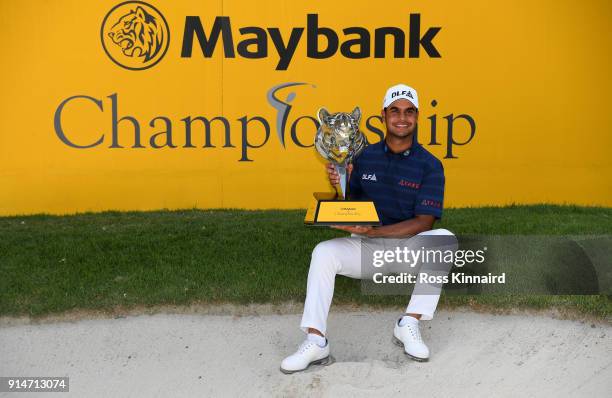 Shubhankar Sharma of India poses with the trophy after winning the Maybank Championship Malaysia at Saujana Golf and Country Club on February 4, 2018...