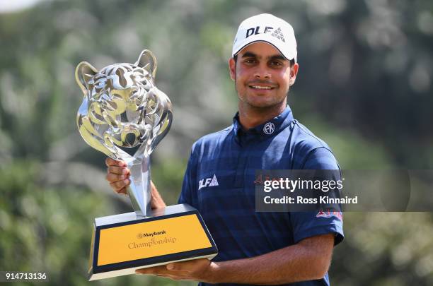 Shubhankar Sharma of India poses with the trophy after winning the Maybank Championship Malaysia at Saujana Golf and Country Club on February 4, 2018...