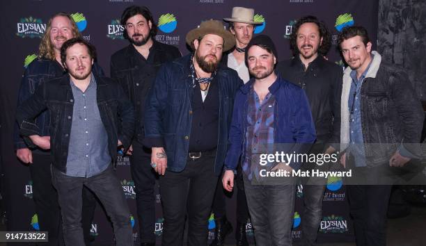 Nathaniel Rateliff and the Night Sweats pose for a photo before performing an EndSession hosted by 107.7 The End at Chop Suey on February 5, 2018 in...