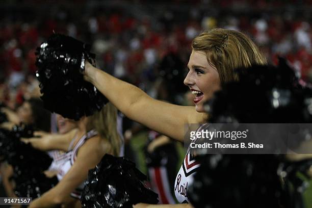 Red Raider cheerleaders cheer during the Houston Cougars playing against the Texas Tech Red Raiders at Robertson Stadium on September 26, 2009 in...