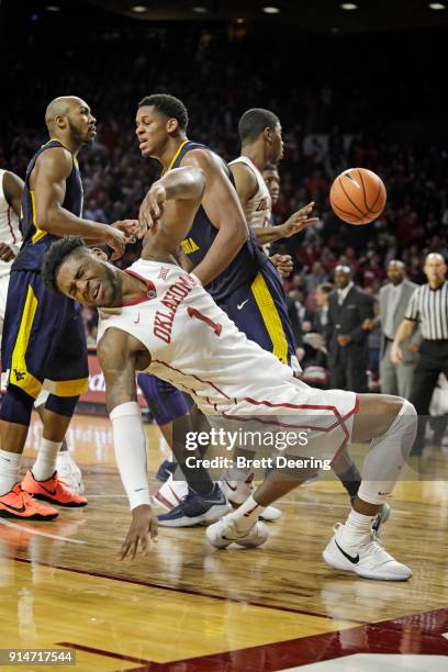 Rashard Odomes of the Oklahoma Sooners reacts after being hit on defense against the West Virginia Mountaineers at Lloyd Noble Center on February 5,...