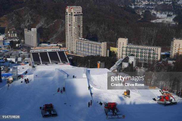 Workers prepare the extreme skiiing courses ahead of the PyeongChang 2018 Winter Olympic Games at Phoenix Park on February 6, 2018 in...
