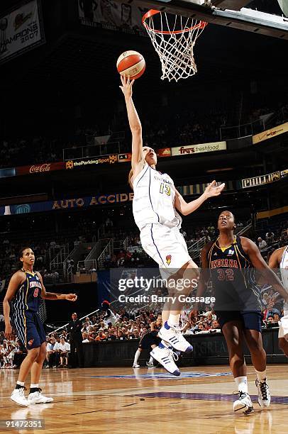 Penny Taylor of the Phoenix Mercury shoots a layup against Ebony Hoffman of the Indiana Fever in Game one of the WNBA Finals during the 2009 WNBA...