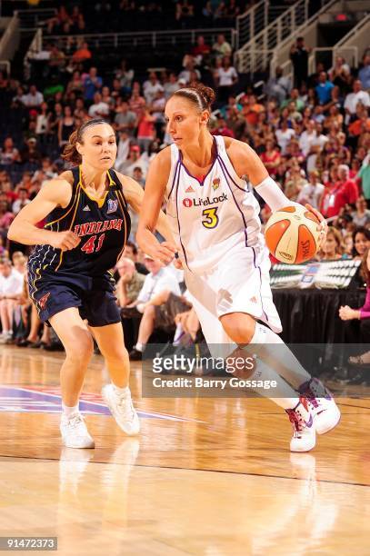 Diana Taurasi of the Phoenix Mercury moves the ball up court past Tully Bevilaqua of the Indiana Fever in Game one of the WNBA Finals during the 2009...