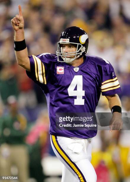 Quarterback Brett Favre of the Minnesota Vikings celebrates after a touchdown during the game against the Green Bay Packers on October 5, 2009 at...
