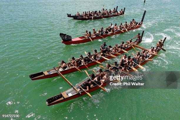 Fleet of Waka make their way around Te Ti Bay on February 6, 2018 in Waitangi, New Zealand. The Waitangi Day national holiday celebrates the signing...