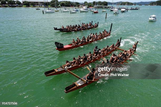 Fleet of Waka make their way around Te Ti Bay on February 6, 2018 in Waitangi, New Zealand. The Waitangi Day national holiday celebrates the signing...