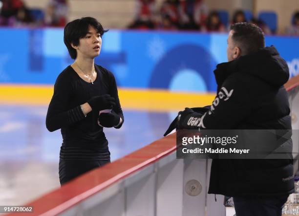Jun Hwan Cha of Korea in discussion with his coach during Figure Skating training ahead of the PyeongChang 2018 Winter Olympic Games at Gangneung Ice...