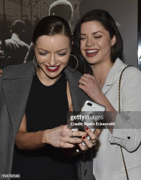 Francesca Eastwood and Morgan Eastwood take selfie together at the premiere of Warner Bros. Pictures' "The 15:17 to Paris" at Warner Bros. Studios on...